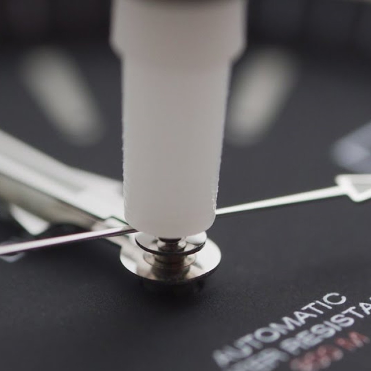 Watch hand presser tool top